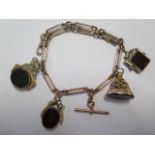 A 9ct gold pocket watch chain of bar link design with four hardstone set fobs, stamped 9.375, approx