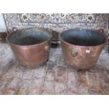 A matched pair of 19th century copper log bins, 34cm tall x 47cm and 35cm x 49cm, both with age