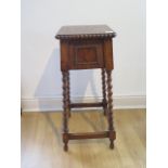 A 1930's oak barley twist plant stand, 77cm tall x 28cm x 29cm, top in good condition
