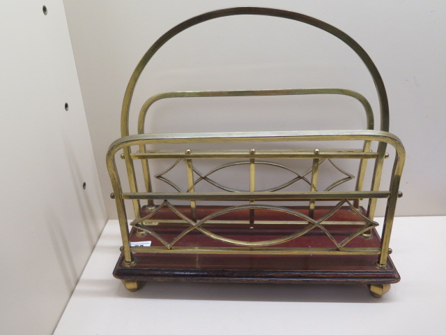 A nice brass and mahogany paper rack, 35cm tall x 36cm x 16cm, in sound condition