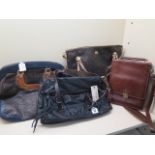 An All Saints black leather handbag, 38cm wide, a Coach leather shoulder bag, 40cm wide, a