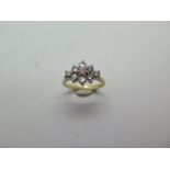 A good quality 18ct yellow gold 9 stone diamond ring, hallmarked, size K, diamonds approx 0.08ct