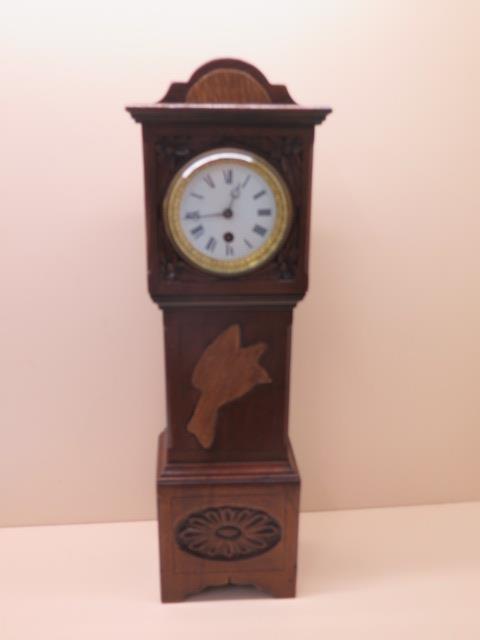 An oak case miniature longcase clock with French movement 8 day, 23cm high, running in saleroom