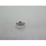 A hallmarked 950 platinum diamond solitaire ring, the square cut diamond approx 0.38ct weight,