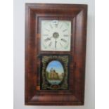 An American wall clock with printed riverscape picture to the hinged door, 66cm high, small losses