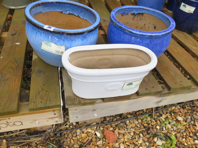 Three glazed pots