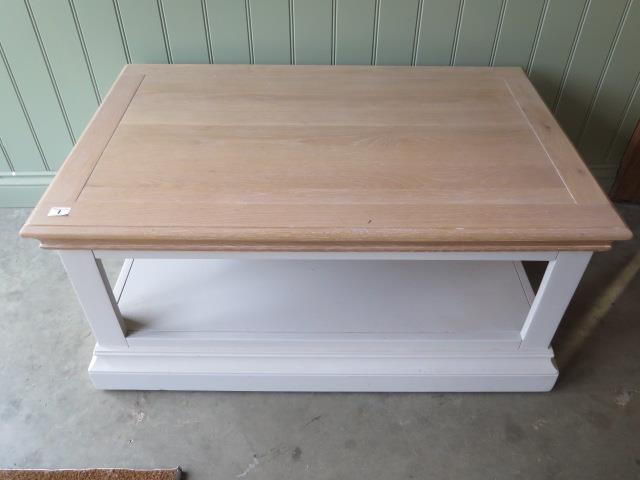 A painted coffee table with an oak top, 97cm wide x 47cm high, ex-display as new