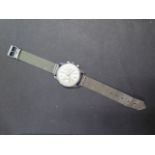 A lings 21 Prix 1960's manual wind anti-magnetic gents wristwatch, 36mm wide, running in saleroom,