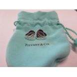 A pair of Tiffany silver heart shaped earrings, stamped 'PLEASE RETURN TO TIFFANY & Co NEW YORK