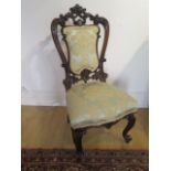 A pretty carved Victorian side chair recently reupholstered, 91cm tall