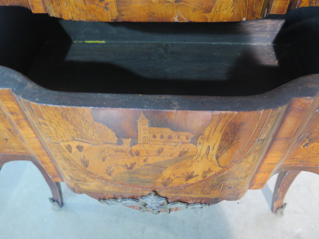 A French 19th century two drawer chest with marble top over a shaped marquetry inlaid base comprised - Image 8 of 10