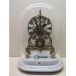 A late 19th century skeleton clock with single chain drive fusee movement on a stepped marble base