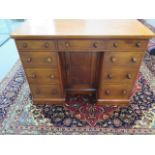 A Victorian mahogany nine drawer kneehole desk in good polished condition, 77cm tall x 106cm x 48cm