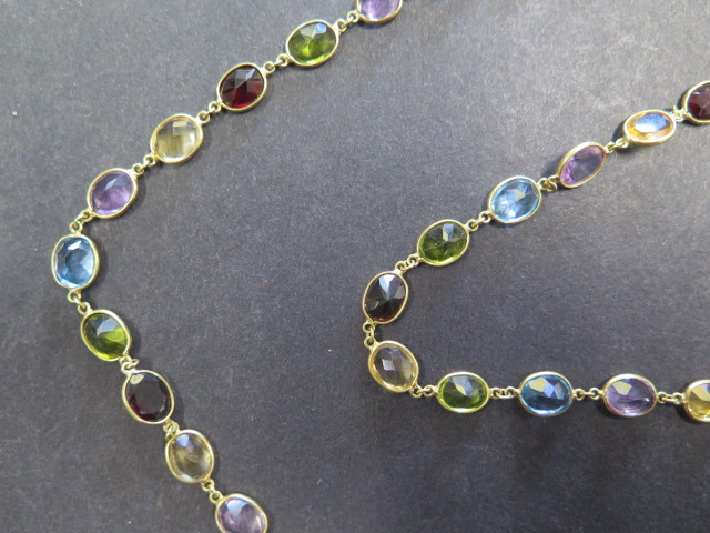 An 18ct yellow gold multigem sapphire, garnet, citrine, peridot necklace, approx 72cms long, total - Image 3 of 4