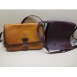 A Cuoieria Fiorentia two tone leather satchel type handbag, 30cm wide, and one further Cuoieria