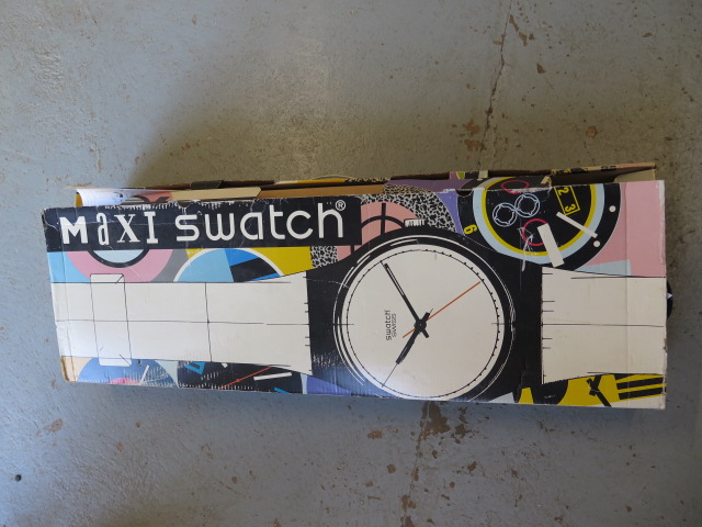 A Maxi Swatch wallclock 1991 in original box, box is 100cm long, clock in original packing, some - Image 3 of 3