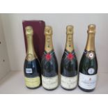 Two bottles of Moet and Chandon Brut Imperial Champagne, a bottle of Pierre Darcys Brut champagne