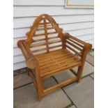 A teak garden chair, ex-display