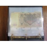 An album containing a vintage banknote collection
