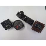 Three military or aircraft dials and a bakelite morse code