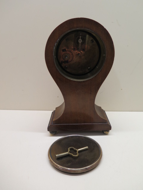 An 8 day mahogany case balloon mantle clock with inlay, 23cm tall, running in saleroom - Image 3 of 4