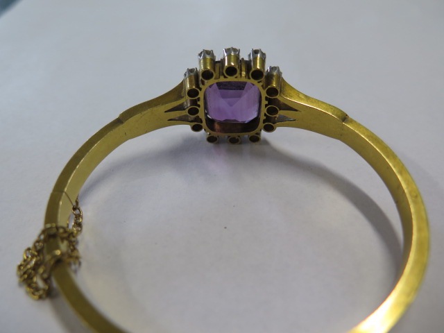An impressive continental gold Amethyst and diamond hinged bangle, the central Amethyst is approx - Image 2 of 3