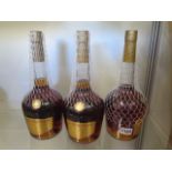 Three bottles of Courvoisier le Voyage de Napoleon VS Cognac, retailing at £40 a bottle, level low