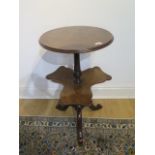 A Victorian walnut bookstand sidetable missing brass gallery, 75cm tall, 43 diameter top