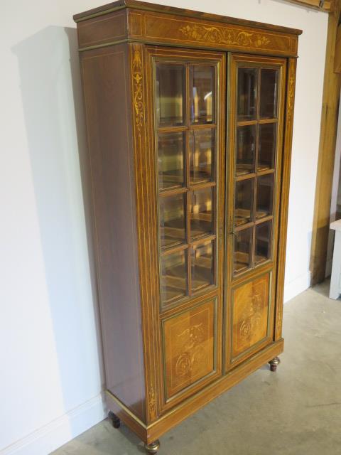 A French 19th century rosewood inlaid bookcase, the glazed doors opening to reveal five internal - Image 4 of 7