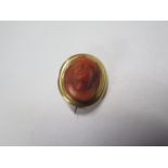 A French gold coral cameo brooch with a hinged back, tests to approx 18ct, 2cm x 1.8cm x 1.2cm deep,