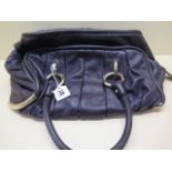 A Bally purple leather handbag with gilt metal hardware, 40cm wide, signs of light use, a little