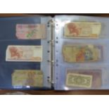 An album containing 138 World bank notes