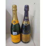 A 1982 bottle of Veuve Clicquot Ponsardin Brut champagne and a bottle of Veuve Clicquot Ponsardin