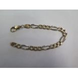 A 9ct bi-colour bracelet, 23cm long, approx 26.2 grams, some wear but generally good condition