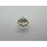 A good quality 18ct yellow gold 9 stone diamond ring, hallmarked, size K, diamonds approx 0.08ct