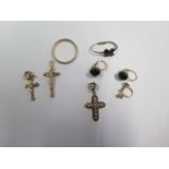 A gold ring, size Q, approx 1.9 grams, 3 small crucifixes, all test to approx 18ct, approx 2.8