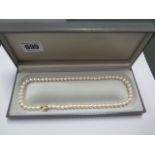 A string of pearls with a 9ct gold clasp, 42cm long, pearls approx 5mm diameter, in good condition