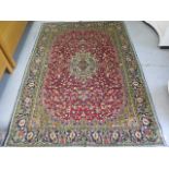 A hand knotted woollen fine Kashan rug, 2m x 1.12m, in good condition