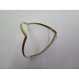 A 9ct yellow gold triangular bangle marked 9ct SB & SLD, total weight approx 26 grams, some usage