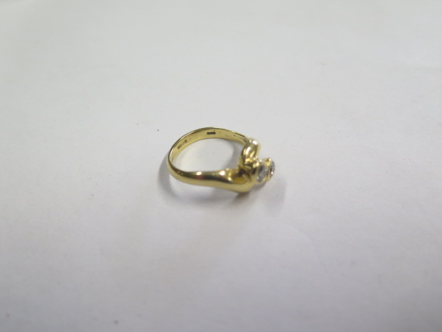 A hallmarked 18ct yellow gold diamond crossover ring, diamonds approx 0.20ct each, size K, approx - Image 2 of 3