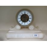 An alabaster drum mantle clock, 23cm tall, running in saleroom