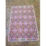 A new hand knotted woollen Chobi Kilim rug, 1.5m x 1m