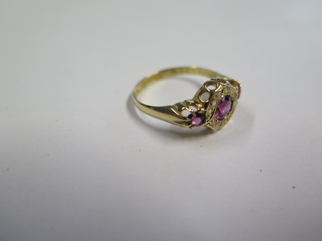 A pretty hallmarked 18ct yellow gold diamond and ruby ring, size O, approx 2.6 grams, central - Image 2 of 3