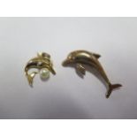 A 14ct gold dolphin and pearl pendant, approx 2.7 grams, and a hallmarked 9ct gold dolphin brooch,