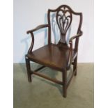 A Georgian oak open armchair with solid seat, 98cm tall x 62cm wide