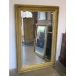 A large gilt over mantle mirror, 144cm x 97cm