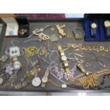 A collection of assorted costume jewellery and watches