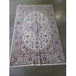 A hand knotted woollen Kashan rug, 2.17m x 1.36m, in good condition