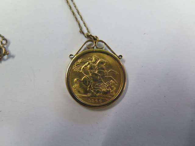 An Elizabeth II gold full sovereign, dated 1966, in a hallmarked 9ct gold pendant mount on a fine - Image 2 of 3