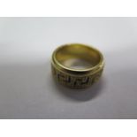 An 18ct yellow gold and diamond band ring, size N, with Greek key design, approx 9.5 grams marked